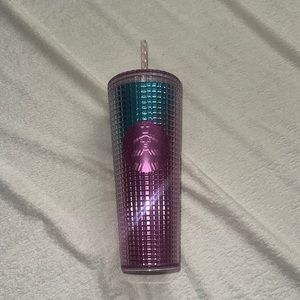 Trenta sized Starbucks cup. Multi color with squared pattern